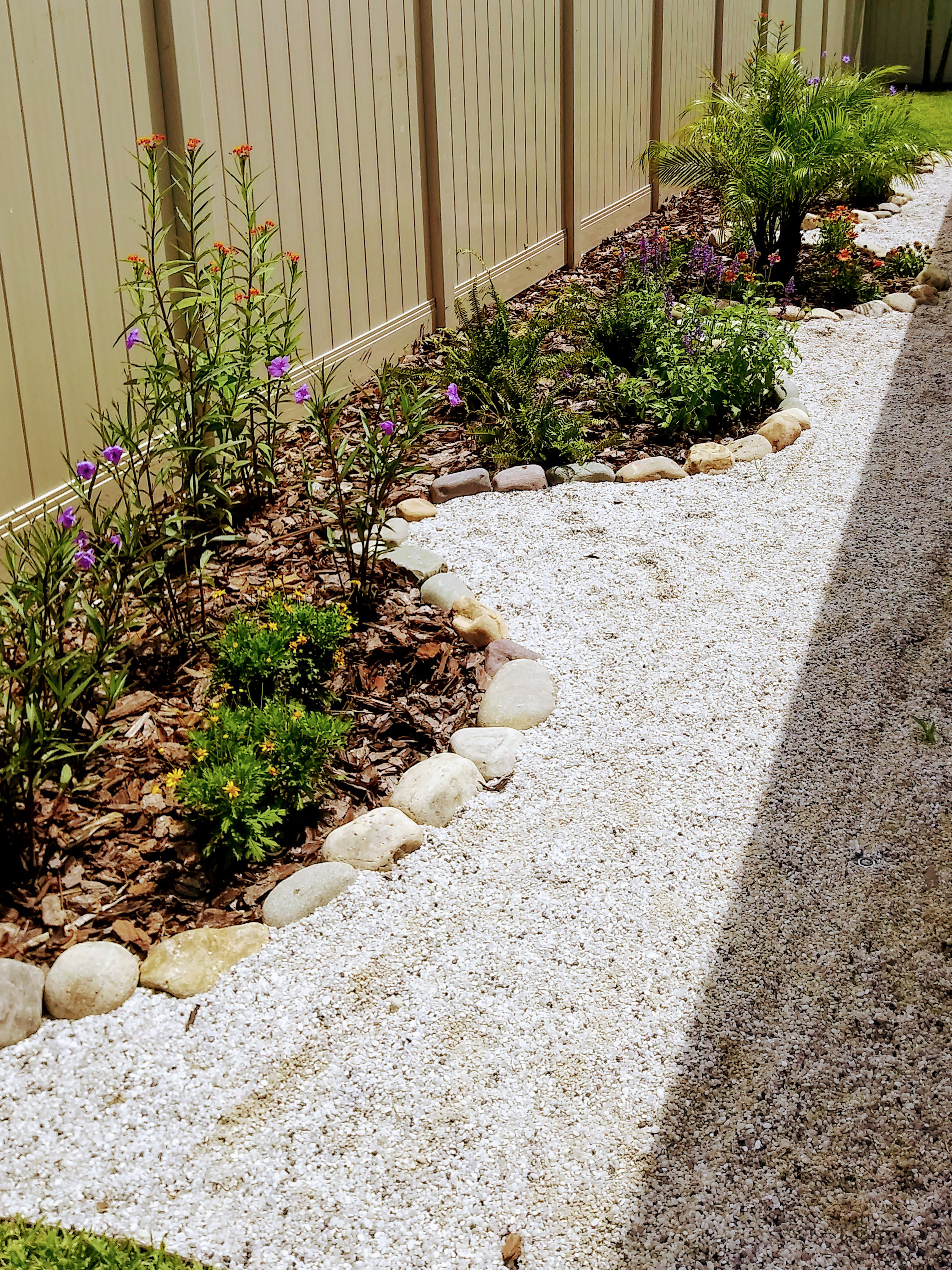 A Winding Gravel Path Surrounded by Greenery